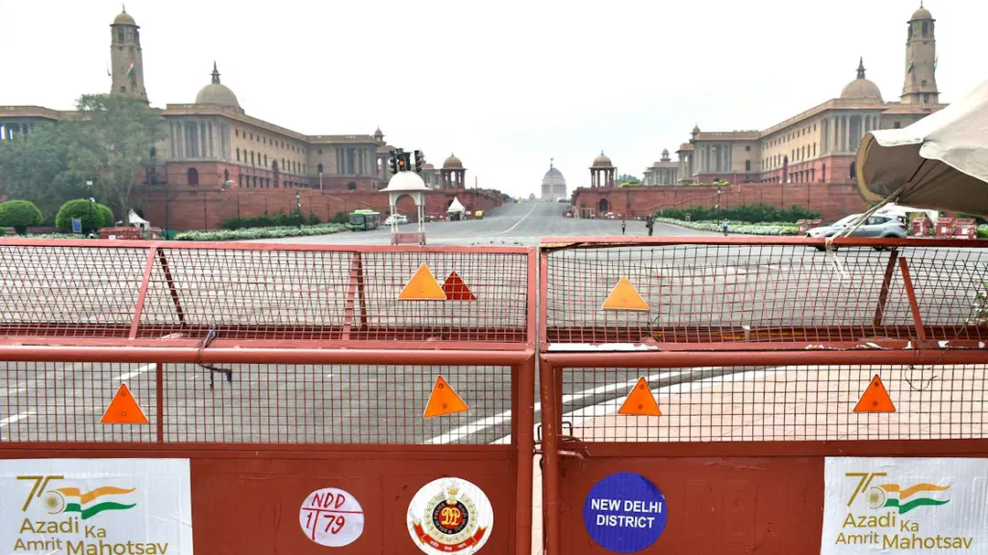 Police barricades across a road leading to the Secretariat buildings in New Delhi